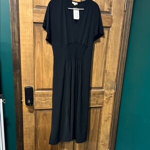Smocked-Waist Black Midi Dress with Flutter Sleeves